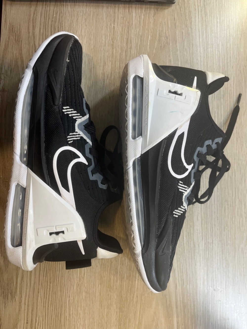 Nike LeBron Witness 6 TB basketball shoes in a black and white colorway